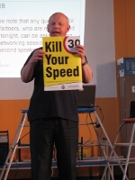 Bill holding up a Kill Your Speed sign which he hopes to deploy around the Schools